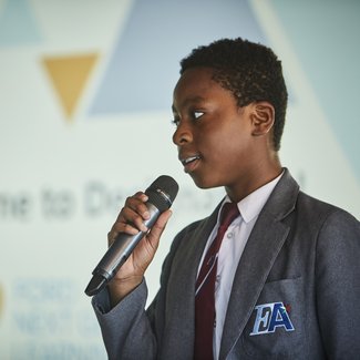 student speaking at event