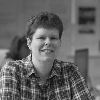 debs_web_headshot-2e16d0ba-fill-650x650-bw